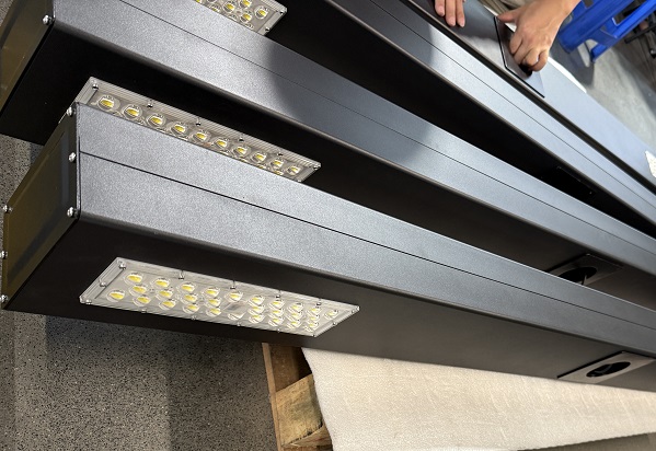 What materials are used for solar street light poles?