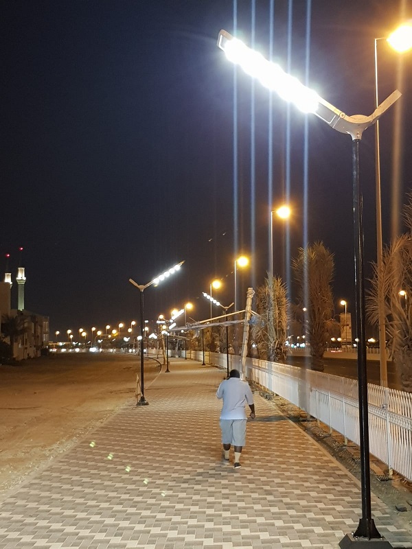 What is the relationship between the illumination angle of the lamp pole and road safety?